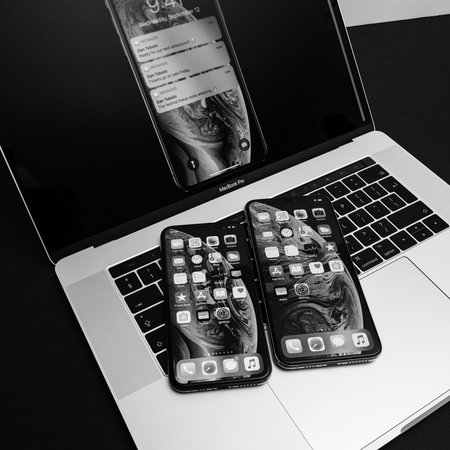 PARIS, FRANCE - SEP 25, 2018: New iPhone Xs and Xs Max smartphones model by Apple Computers close up...