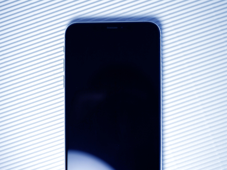PARIS, FRANCE - SEP 27, 2018: Part detail of new iPhone Xs Max smartphone model by Apple Computers close up with black display screenのeditorial素材