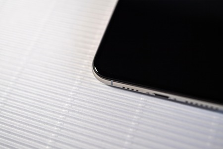 PARIS, FRANCE - SEP 27, 2018: new iPhone Xs Max smartphone model by Apple Computers close up with black display screenのeditorial素材