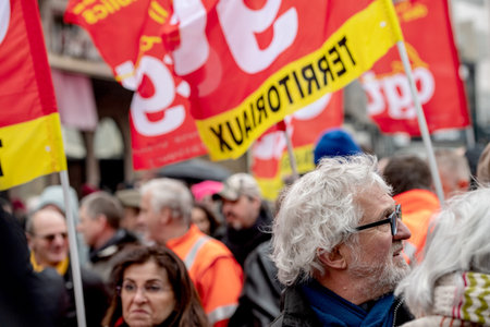 STRASBOURG, FRANCE - MAR 22, 2018: CGT General Confederation of Labour workers with placard at...