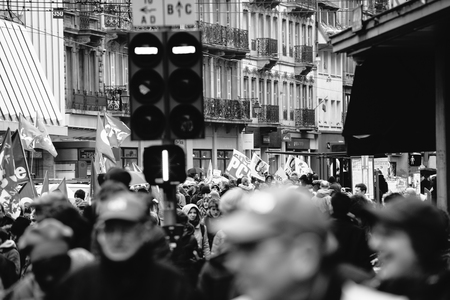 STRASBOURG, FRANCE - MAR 22, 2018: CGT General Confederation of Labour workers with placard at demonstration protest against Macron French government string of reforms - black and white of protestorsのeditorial素材