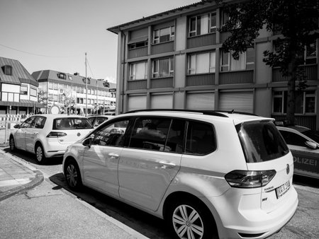 KEHL, GERMANY - SEP 1, 2017: Fleet of yellow Volkswagen Golf cars parked near construction site in German city - black and whiteのeditorial素材