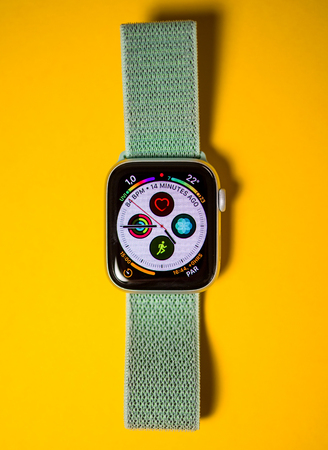 PARIS, FRANCE - SEP 28, 2018: New Apple Watch Series 4 last generation with multiple complications on the clock watch face showing heart, temperature, altitude, time etcのeditorial素材