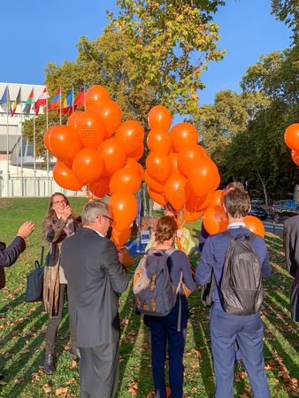STRASBOURG, FRANCE - OCT 18, 2018: Permanent Representation of the Netherlands balloon launch in front of Council of Europe inauguration of the exhibition Open Your Eyes to Human Traffickingのeditorial素材