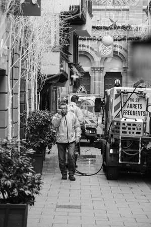 STRASBOURG, FRANCE - DEC 11, 2018: Public services team cleaning bood traces of terrorist attacks on Rue des Orfevres a day after Cherif Chekatt killed at least two people and wounded 12のeditorial素材