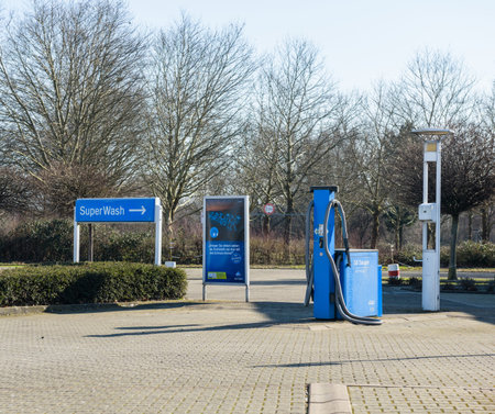 Kehl, Germany - Feb 25, 2018: Part of Aral Gas Station in Germany with vacuum cleaner pump