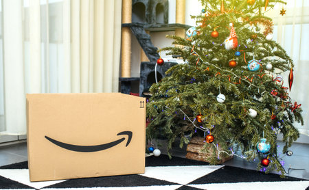 PARIS, FRANCE - DEC 26, 2018: Large freshly received Amazon Prime parcel cardboard box near...