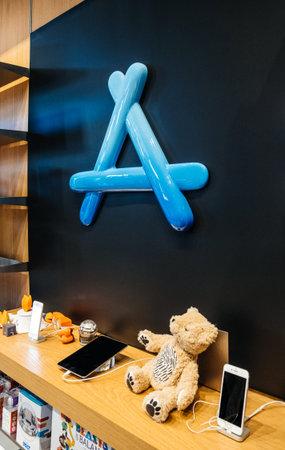 PARIS, FRANCE - OCT 25, 2018: Apple Computers App Store sign on the wall - embossed plastic showing...