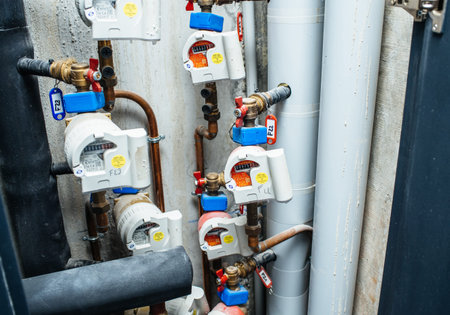 Paris, France - Dec 26, 2018: Industrial drawer with multiple water counters on pipes of a modern apartment office buildingのeditorial素材