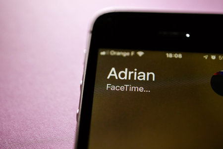 Paris, France - Jan 30, 2018: Close-up macro shot of Apple iPhone SE call from Adrian with FaceTime...
