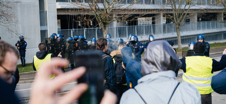 STRASBOURG, FRANCE - FEB 02, 2018: Crowd aggression over French police officers  during protest of...
