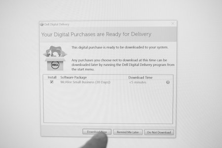 Paris; France - Oct 24; 2018: Your digital Purchases are ready for delivery message - McAfee Small...