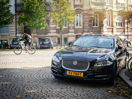 Strasbourg, France - OCt 1, 2017: Jaguar luxury black car parked on the colbblestone of iconic Place...