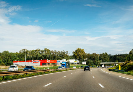 Strasbourg, France - Oct 7, 2017: Driver POV at multiple cars on A4 French highway with multiple...