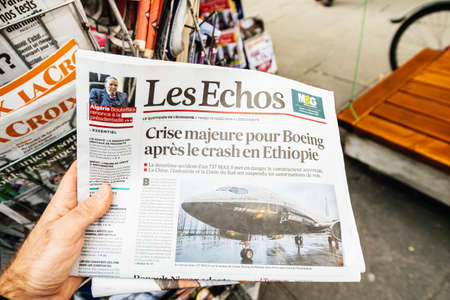 Paris, France - Mar 12, 2019: Man POV buy Les Echos newspaper featuring article about major crisis for Boeing after crash accident in Ethiopiaのeditorial素材