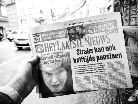 Paris, France - Mar 15, 2019: British MPs have voted for a delay in the Brexit process for three months or more newspaper het laatste nieuws with cover featuring British PM Theresa May black and whiteのeditorial素材