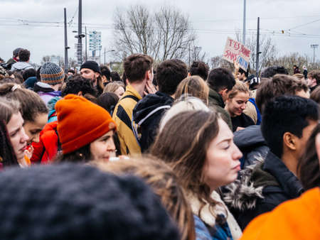 STRASBOURG, FRANCE - MAR 15, 2019: Crowd of protesters near European Parliament during demonstrations against climate change global movement Fridays for Future started by Swedish schoolgirlのeditorial素材
