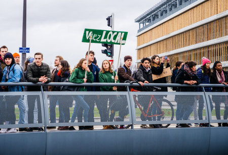 STRASBOURG, FRANCE - MAR 15, 2019: Vivez Local banner held by protesters near European Parliament during demonstrations against climate change global movement Fridays for Future started by Swedish schoolgirl Greta Thunbergのeditorial素材