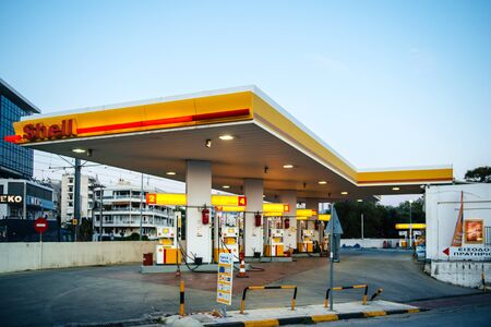 Athens, Greece - Mar 28, 2016: Empty Modern Shell gas station illuminated at dusk in on of the neighborhoods of Athens near the portのeditorial素材