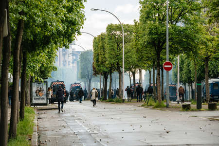 Strasbourg, France - Apr 28, 2019: Police securing European institutions with teargas Allee de la robertsau during Yellow VEst Gilets Jaunes protestのeditorial素材