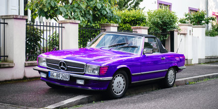 Strasbourg, France - May 19, 2017: Beautiful vintage purple convertible cabriolet Mercedes-Benz 300...