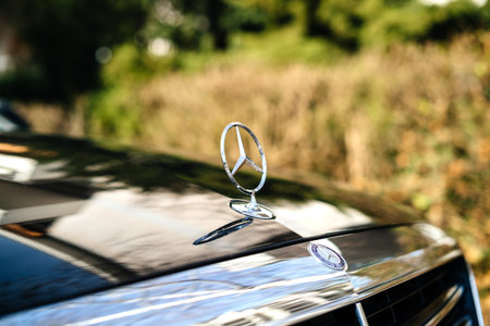 Paris, France - Feb 23, 2017: Side view of star shape logotype for Mercedes-Benz brand on the new...