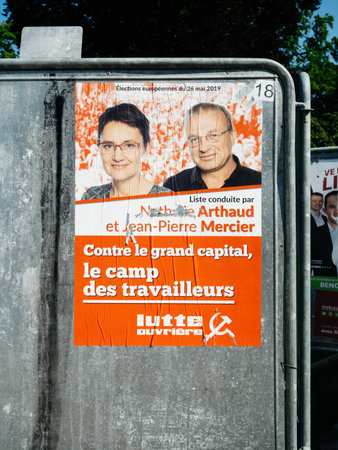 Strasbourg, France - May 23, 2019: Posters in green sunny park for 2019 European Parliament election featuring French Lutte Ouvriere with Nathalie Arthaud and Jean-Pierre Mercierのeditorial素材