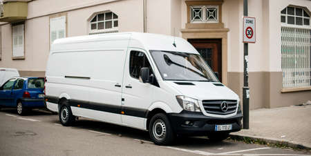 Strasbourg, France - Apr 5, 2017: White Mercedes-Benz Sprinter van parked on French street  - delivery vanのeditorial素材
