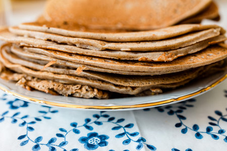 Delicious homemade pancakes arranged on stack on a plate early in the morning organic bio inredients...