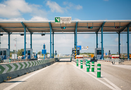 Lisbon, Portugal - June 1, 2014: Reservada a aderentes - reserved for members - special lane on Portuguese highway toll road - driver pov on a warm summer day empty roadのeditorial素材