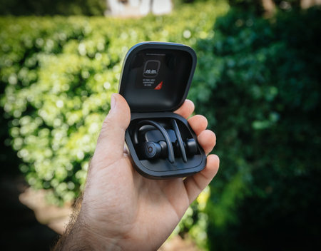 Paris, France - Jun 17, 2019: Side view of Powerbeats Pro Beats by Dr Dre wireless high-performance...