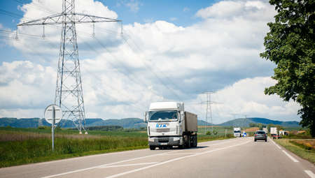 France - May 14, 2014: Fast driving French Renault truck on the highway transporting goods and cargo - Vosges mountains in the backgroundのeditorial素材