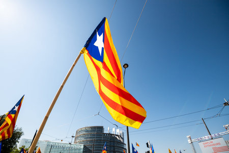Strasbourg, France - Jul 2 2019: Estelada Catalan separatist flag during demonstration protest near...