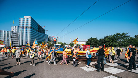 Strasbourg, France - Jul 2 2019: Police guiding People holding Estelada Catalan separatist flags...