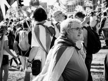 Strasbourg, France - Jul 2 2019: Black and white image of people demonstrate protest front of EU European Parliament against exclusion of three Catalan elected MEPsのeditorial素材