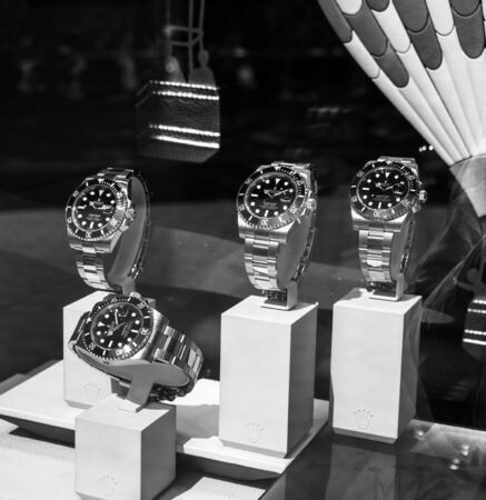 Barcelona, Spain - June 1, 2018: Modern new last collection of luxury wrist Swiss watch manufactured by Rolex model in the official store distributor store showcase square imageのeditorial素材