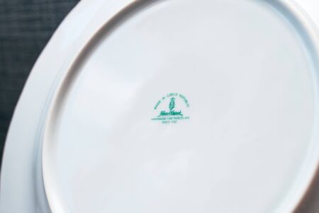 Frankfurt, Germany - Jun 13, 2017: porcelain plate with Made in Czech REpublic handmade fine porcelain since 1972 by Haas and Czjzek detail of chinawareのeditorial素材