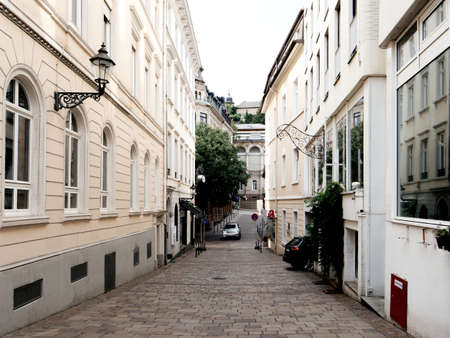 Baden-Baden, Germany - Jul 7, 2019: Cozy street in Baden-Baden with silver SUV driving on the tiny streetのeditorial素材