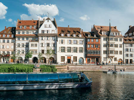 Strasbourg, France - May 5, 2019: Quai des Batelier pedestrian street in central Strasbourg with Batorama tourist boat and Alsatian architectureのeditorial素材