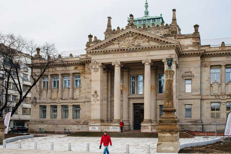 Strasbourg, France - Jun 8, 2019: Pedestrians walking in front of renovated Palais de Justice Tribunal dInstance de Strasbourg new Courthouse - horizontal imageのeditorial素材