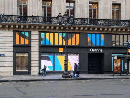 Paris, France - Jan 20, 2019: Elevated view of pedestrians in front of the iconic Orange Store on Rue Halevyのeditorial素材