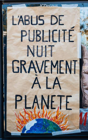 Strasbourg, France - Sep 21, 2019: Advertising destroys planet banner during argest worldwide climate march change started by Swedish climate activist Greta Thunbergのeditorial素材