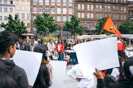 Strasbourg, France - May 18, 2019: Young and adult tamil supporters people occupy central square to protest against alleged human rights abuses genocide by Sri Lankan governmentのeditorial素材