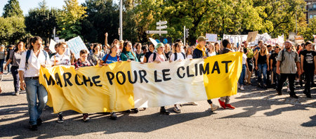 Strasbourg, France - Sep 21, 2019: Placard Marche pour le Climat in people hands during what could...