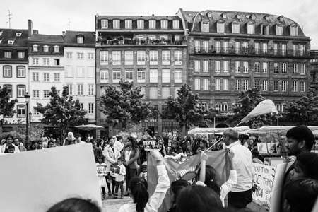 Strasbourg, France - May 18, 2019: Tamil supporters people occupy central Place Kelber square to protest against alleged human rights abuses genocide by Sri Lankan government black and whiteのeditorial素材