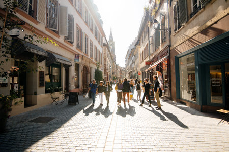Strasbourg, France - Sep 21, 2019: Street view cityscape of Rue des Juifs street with shops people...