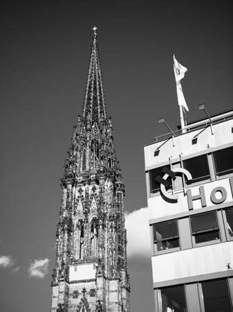 Hamburg, Germany - Mar 2018: St. Nikolai Memorial and icon insignia on the headquarter of Holcim Swiss-based global building materials and aggregates company black and white imageのeditorial素材