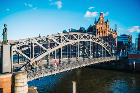 Hamburg, Germany - Mar 20 2018: Side view of the iconic Brooksbrucke bridge with group of young girls walking discovering the cityのeditorial素材