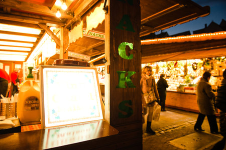 Strasbourg, France - Dec 9, 2016: Traditional Christmas market stall proposing artisanal mulled wine...