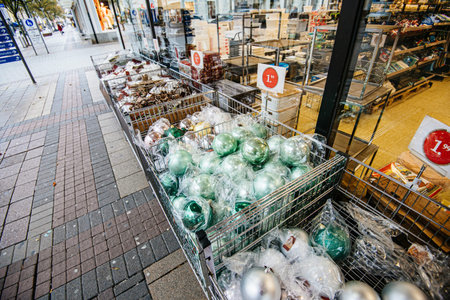 Kehl, Germany - Nov 18, 2019: Multiple products for sale with winter holiday Christmas theme outdoor the Woolworths store in Germanyのeditorial素材